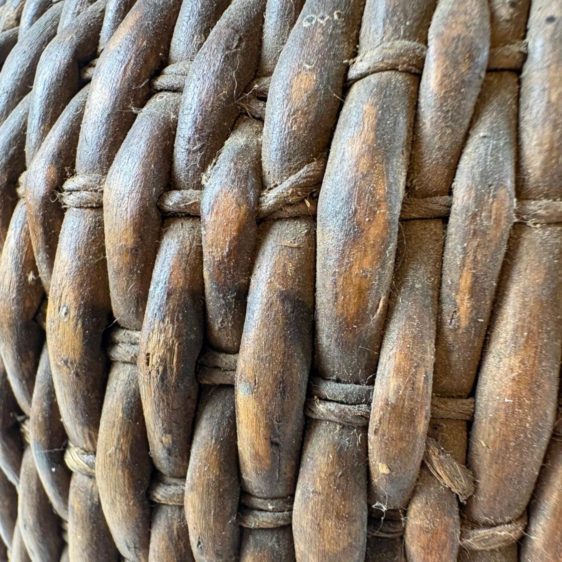 Close-up of a woven basket with brown and gray tones.